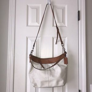 White coach bag with brown trim